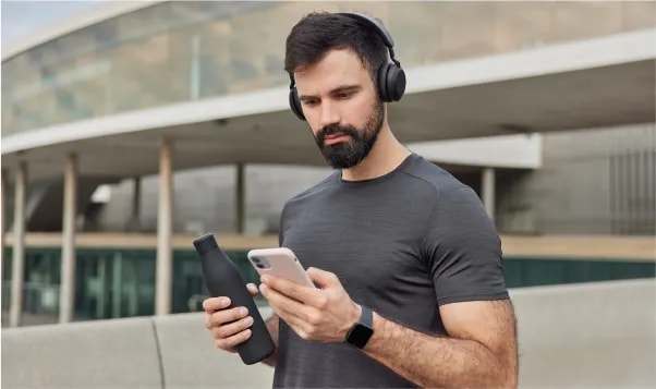 Man checking job alerts on smartphone
